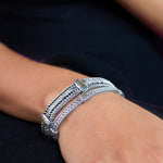 Station Signature Scroll on Woven Two Tone Gold Bracelet