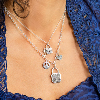 Peace and Love Charms on Alhambra Granulated & Scroll Reversible Padlock Necklace